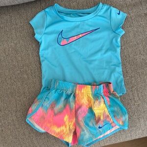 Nike Light Blue Dri-FIT Shirt and Colorful Shorts